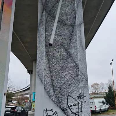 "Large-Scale Portrait Mural" by Cekas in Gdansk