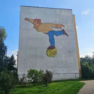 "Footballer Balancing on Medal" by Paweł “Paulus” Mazur in Gdansk