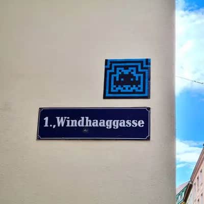 "Pixelated Blue Space Invader" by invader in Vienna