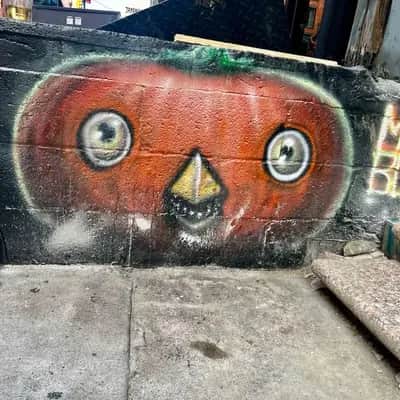 "Orange Masked Face Mural" by MUEBON in New York