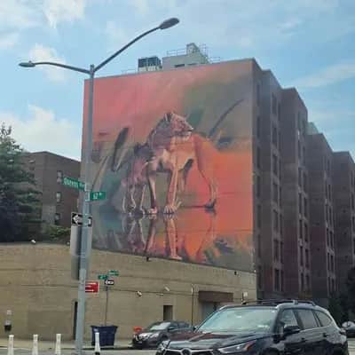 "Prehistoric Saber-Tooth Cat Mural" by Sonny Sundancer in New York