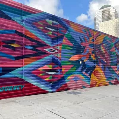 "Geometric Rainbow Burst Mural" by Garden of Journey in New York