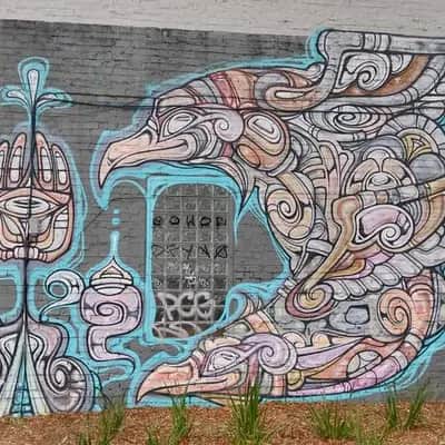 "Mystical Hand and Dragon Mural" by Phibs in Melbourne