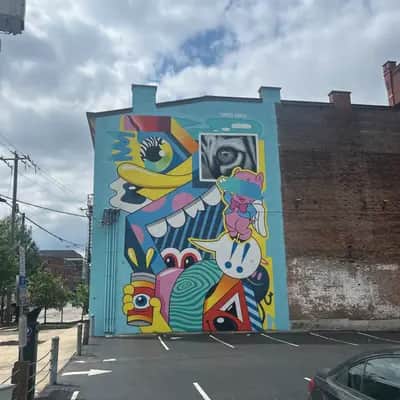 "Surreal Character Collage Mural" by Greg Mike in Cincinnati