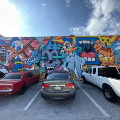 "Cartoon Character Collision Mural" by Greg Mike in St Petersburg