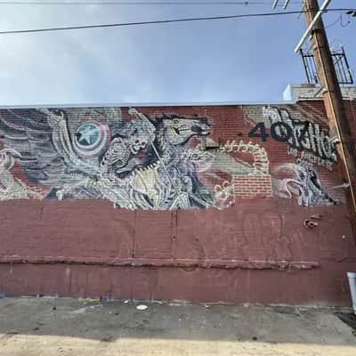 "Skeletal Dragon Mural" by Nychos in Los Angeles