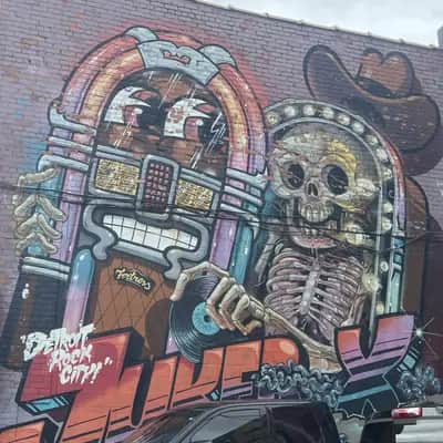 "Skeleton DJ Jukebox Mural" by Nychos in Detroit