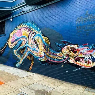 "Colorful Dragon Mural" by Nychos in San Francisco