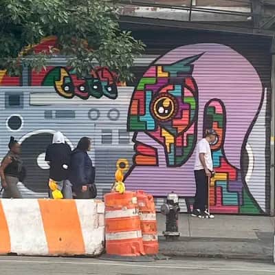 "Colorful Character Street Mural" by Funqest in New York