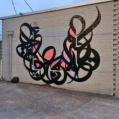 "Walls work both ways" by El Seed in Atlanta