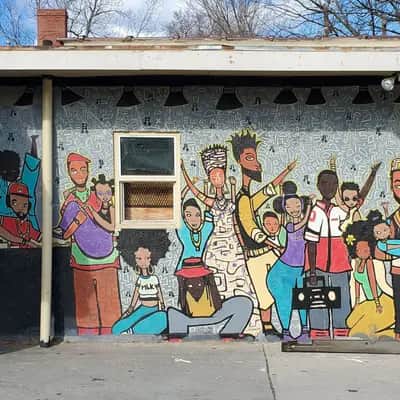 "Community Portrait Mural" by Saleam Bey in Atlanta