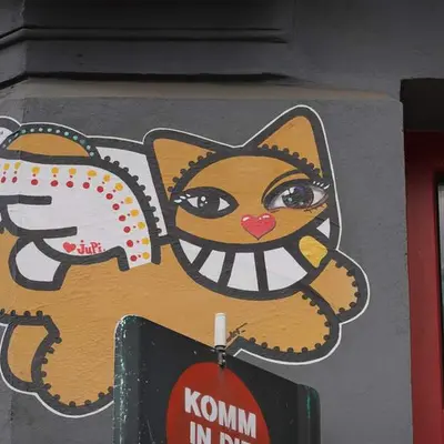 "Grinning Cat Character Mural" by Mr Chat in Hamburg