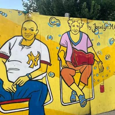 "Two Figures on Yellow Wall" by Jocelyn M. Goode in New York