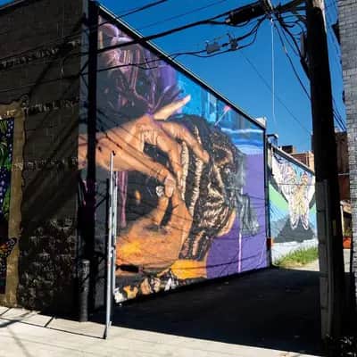 "Hands Cradling Elephant" by Bakpak Durden in Detroit