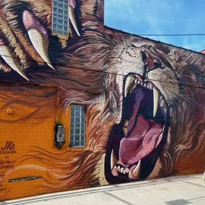 "Roaring Saber-Tooth Cat Mural" by Jay Kopicki in Detroit