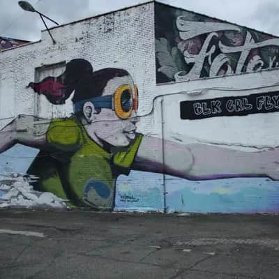 "BLK GRL FLY Superhero Mural" by Hebru Brantley in Detroit