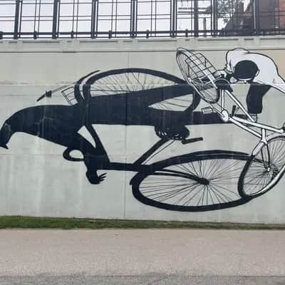 "Cyclist and Shadow Panther" by Alex Senna in Detroit