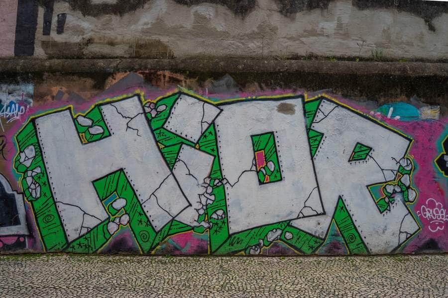 "HOPE Graffiti with Green Money" by HIOR in Lisbon