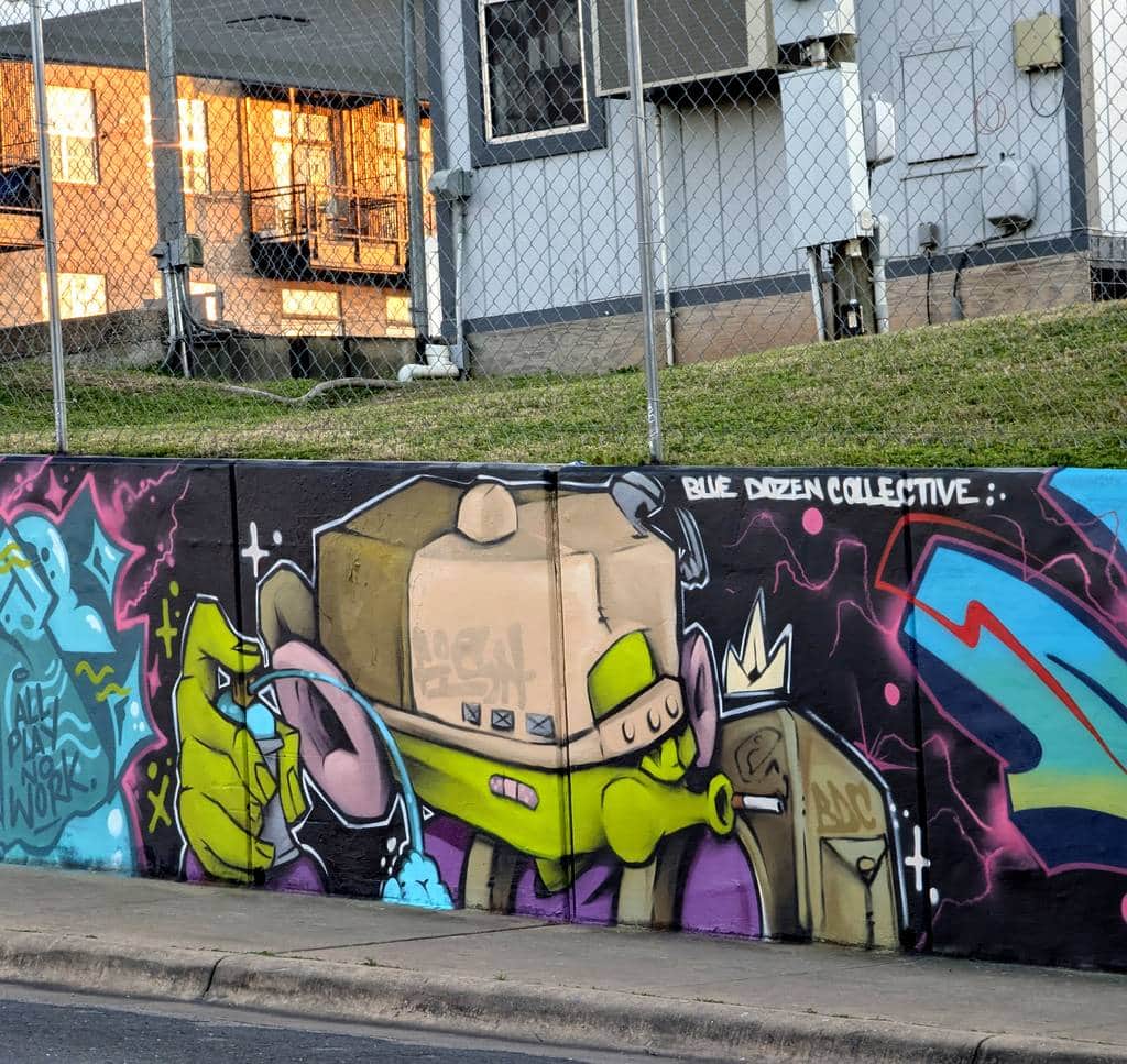 "Blue Dozen Collective Robot Character" by BDC in Austin