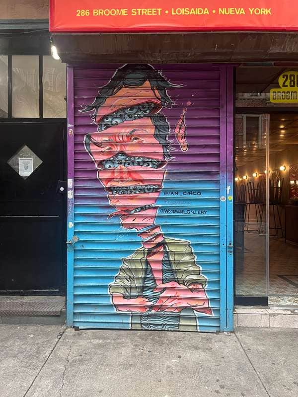 "Fragmented Portrait on Metal Shutters" by Ian_Cinco in New York