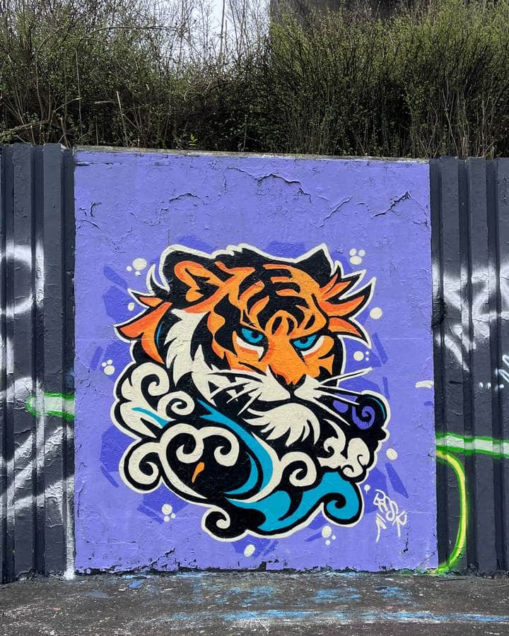 "Tiger Head with Ornamental Swirls" by Besk (Czechia) in Prague