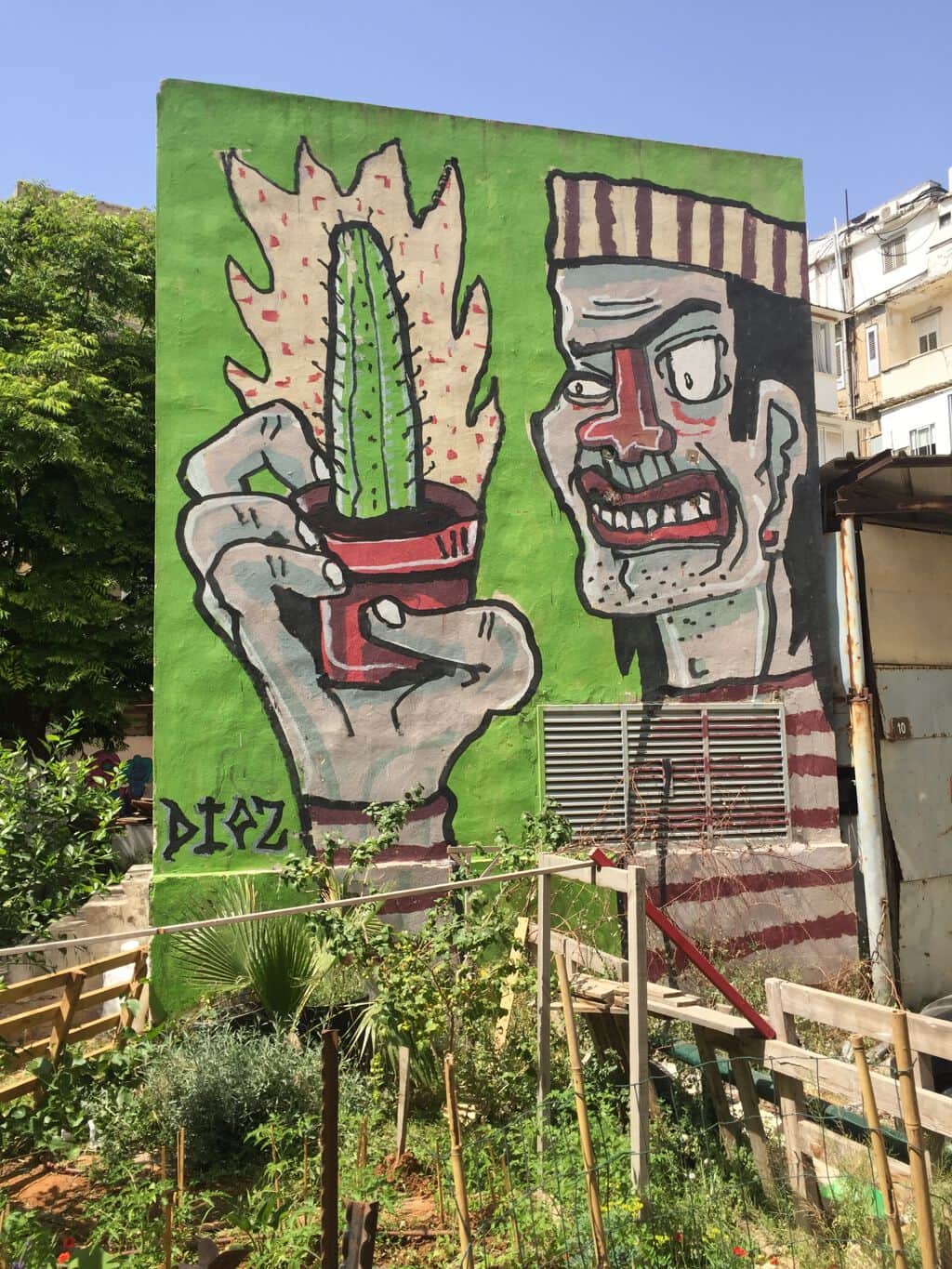 "Cactus Hand and Expressive Face" by Dioz in Telaviv