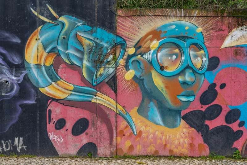 "Surreal Blue Figures with Goggles" by Werens in Lisbon