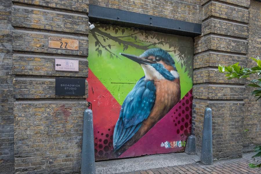 "Vibrant Kingfisher in Flight" by Skyhigh in London