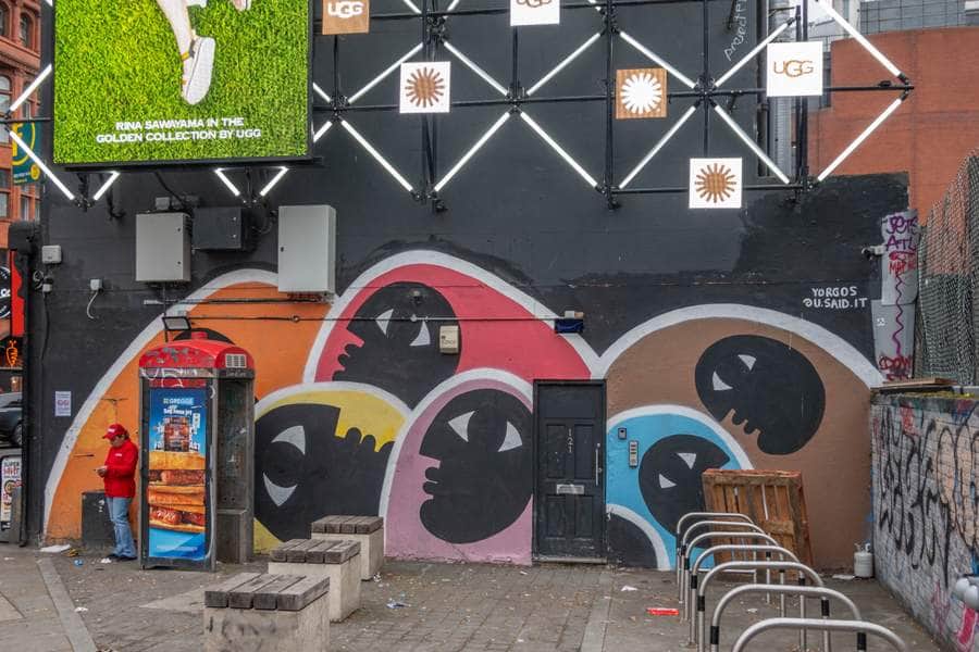"Colorful Faces Street Mural" by Yorgos in London
