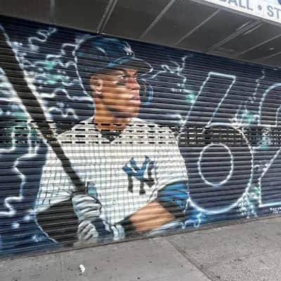 "Baseball Player Street Mural" by Andre Trenier in New York
