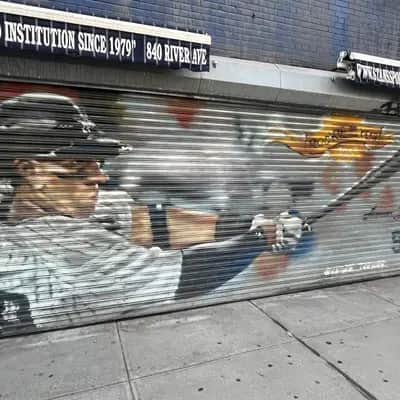 "Baseball Player Metal Shutter Mural" by Andre Trenier in New York