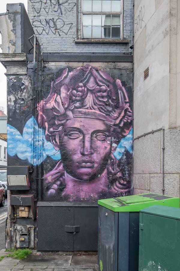 "Purple Classical Head with Clouds" by David Speed in London