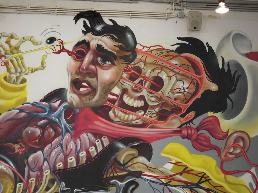 "Anatomical Horror Figure with Exposed Systems" by Nychos in Vienna