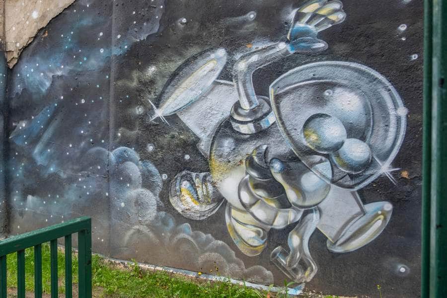 "Astronaut Floating in Cosmic Space" by Fanakapan in London