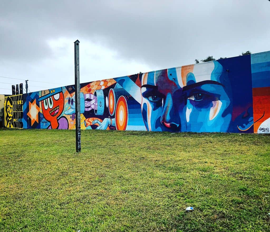 "Colorful Abstract Face Mural" by El Xupet Negre in Miami