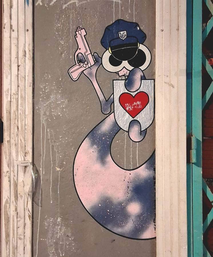 "Armed Figure with Heart" by Qwert in Valencia