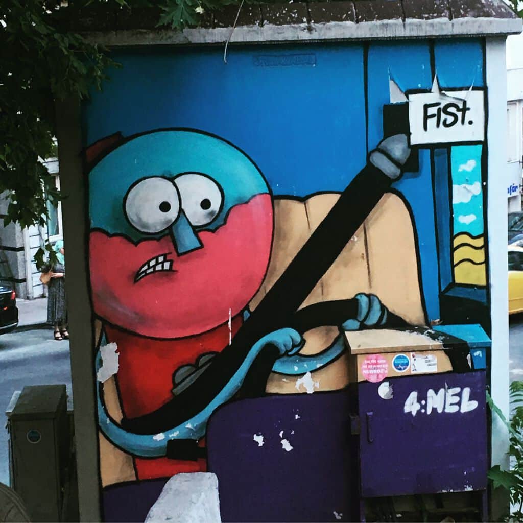 "Fish Holding a Sign" by Wfist in Istanbul