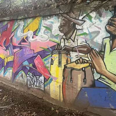 "playing drums cheerfully" in New York