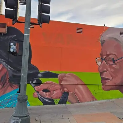 "Portrait of Elderly Man Reading" by Robert Vargas in Los Angeles