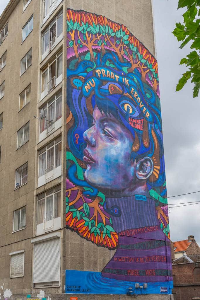 "Colorful Portrait with Floral Framing" by Gui Tar in Brussels