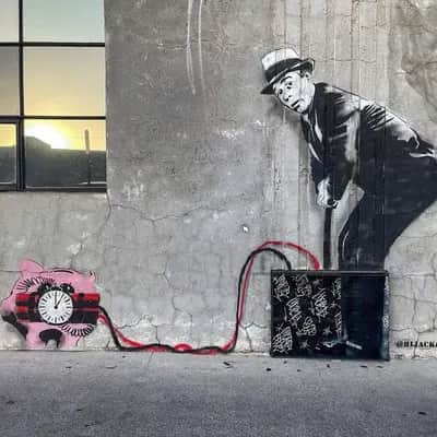 "Businessman Detonating Pink Bomb" by HiJack in Los Angeles