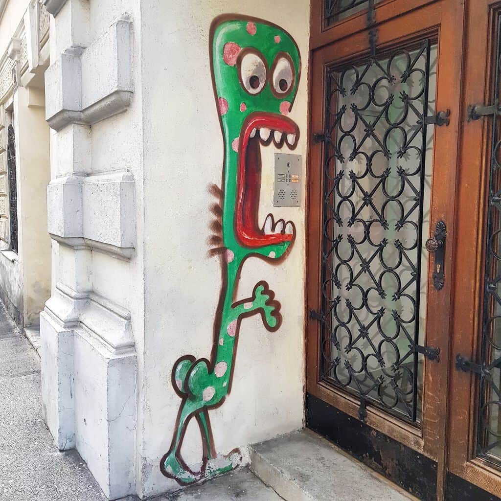 "Whimsical Green Monster Character" by NearCubano in Vienna