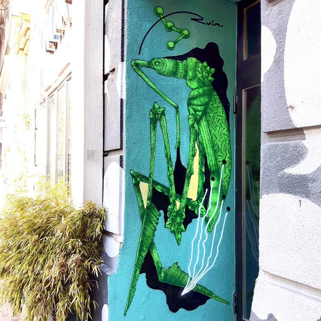 "Vibrant Green Grasshopper" by Ruin in Vienna