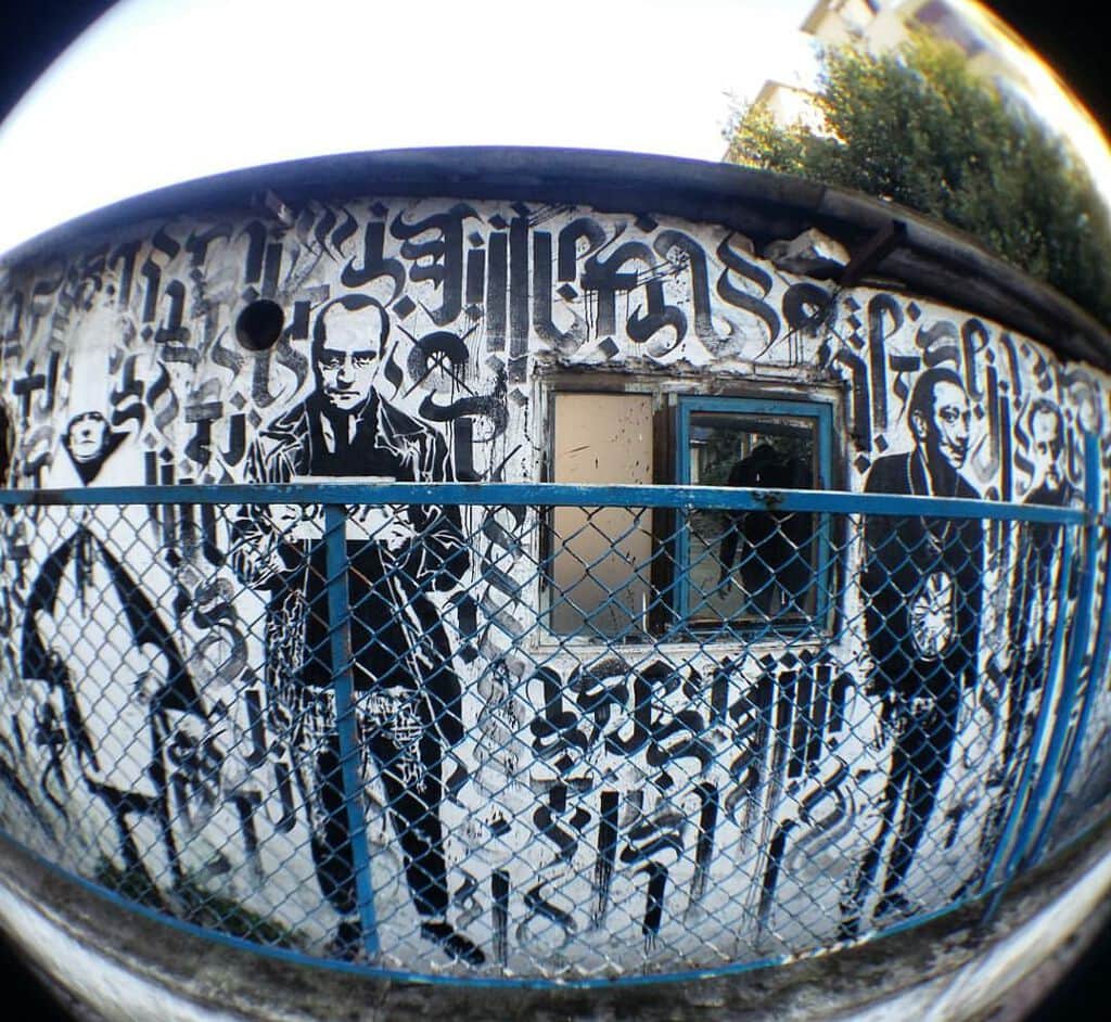 "Monochrome Portraits Behind Chain-Link" in Istanbul
