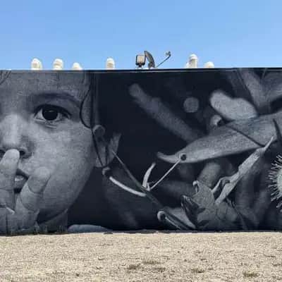 "Child with Silence Gesture" by Royyal Dog in Los Angeles