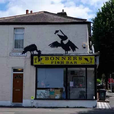 "Pelican and Cormorant Silhouettes" by Banksy in London