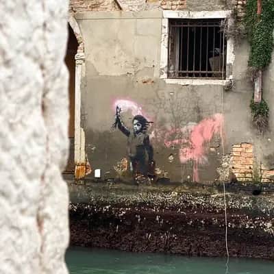 "Umbrella Figure by Water" by Banksy in Venezia