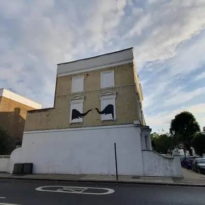 "Black Silhouette Window Figures" by Banksy in London