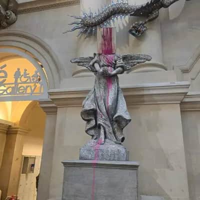 "Paint Pot Angel" by Banksy in Bristol