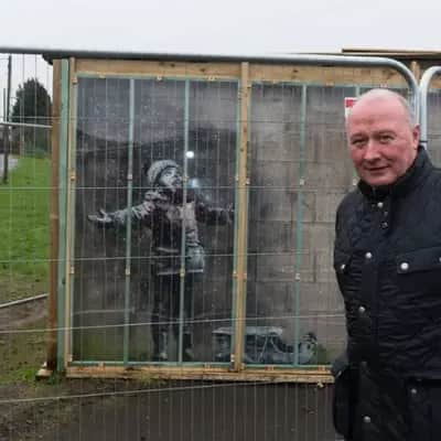 "Season's Greetings" by Banksy in Port Talbot